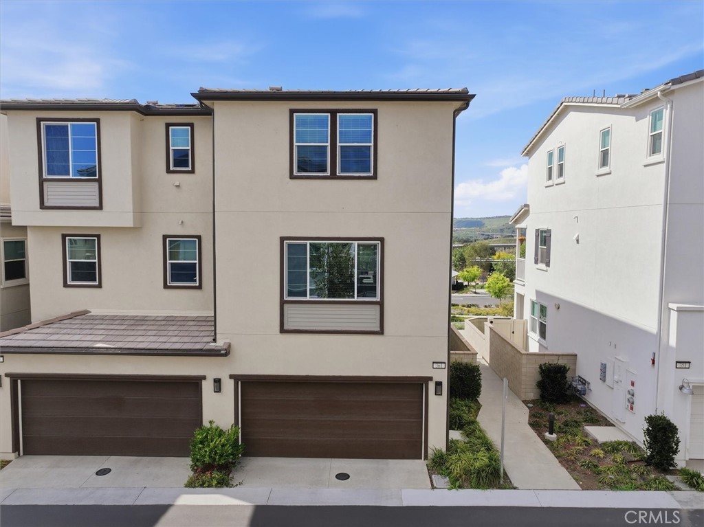 361 Gelding Way Rancho Mission Viejo, CA 92694 - Photo 45 of 59 a front view of a house with a yard
