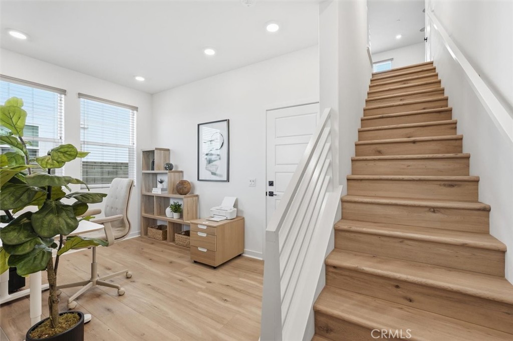 361 Gelding Way Rancho Mission Viejo, CA 92694 - Photo 10 of 59 a living room with furniture and a potted plant