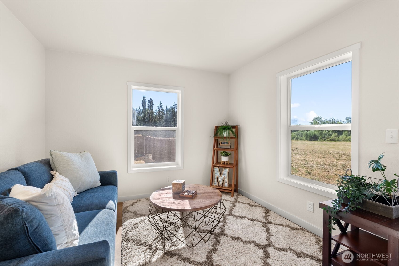 1088 Koontz Road Napavine, WA 98532 - Photo 16 of 36 a living room with furniture and a potted plant