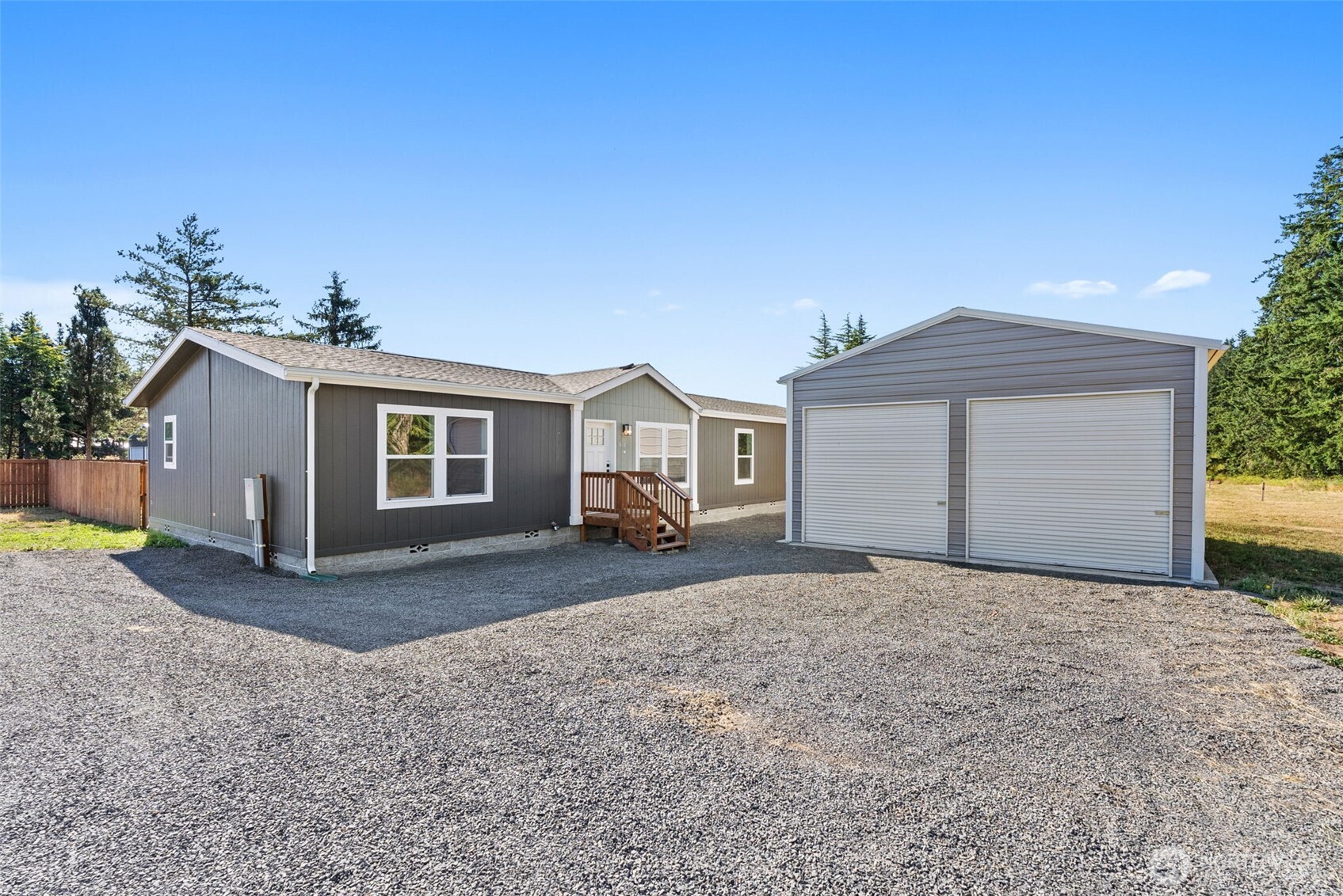 1088 Koontz Road Napavine, WA 98532 - Photo 2 of 36 a front view of a house with a yard
