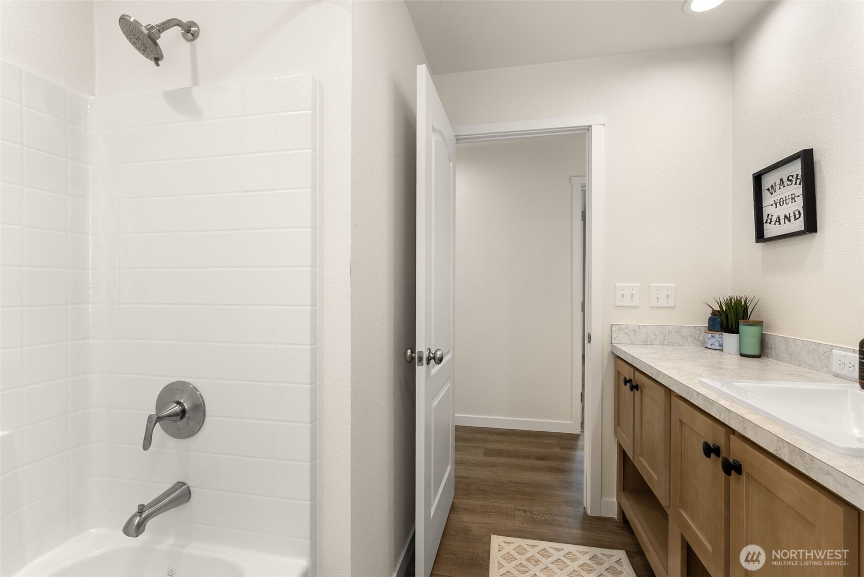 1088 Koontz Road Napavine, WA 98532 - Photo 22 of 36 a bathroom with a granite countertop sink a mirror and a shower