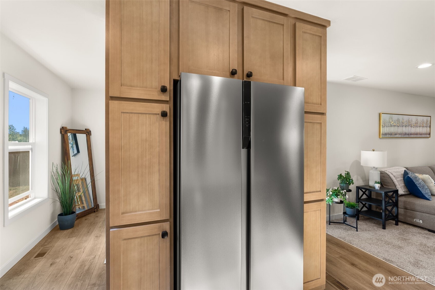1088 Koontz Road Napavine, WA 98532 - Photo 5 of 36 a metallic refrigerator freezer sitting in a kitchen