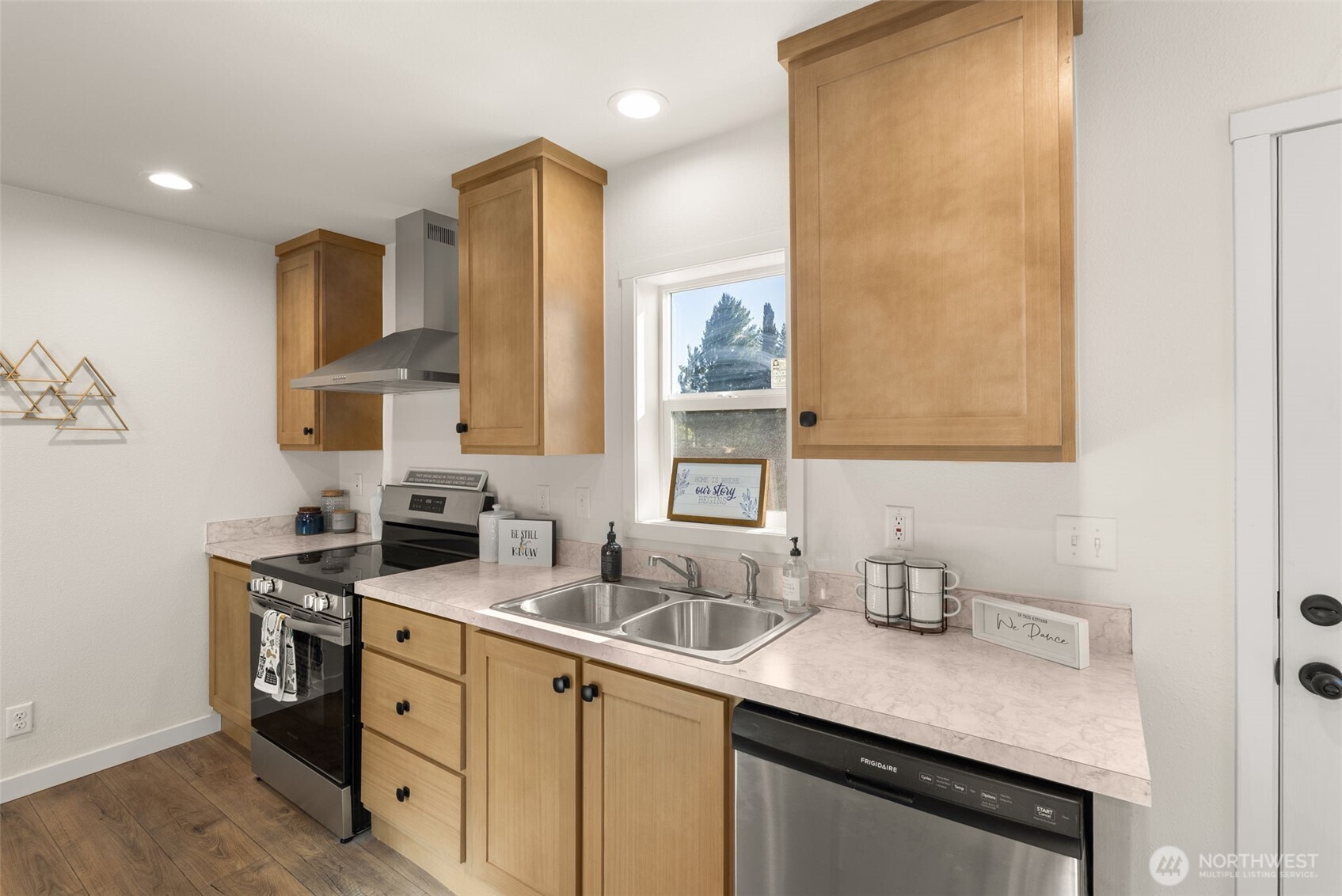 1088 Koontz Road Napavine, WA 98532 - Photo 8 of 36 a kitchen with stainless steel appliances granite countertop a sink stove and cabinets