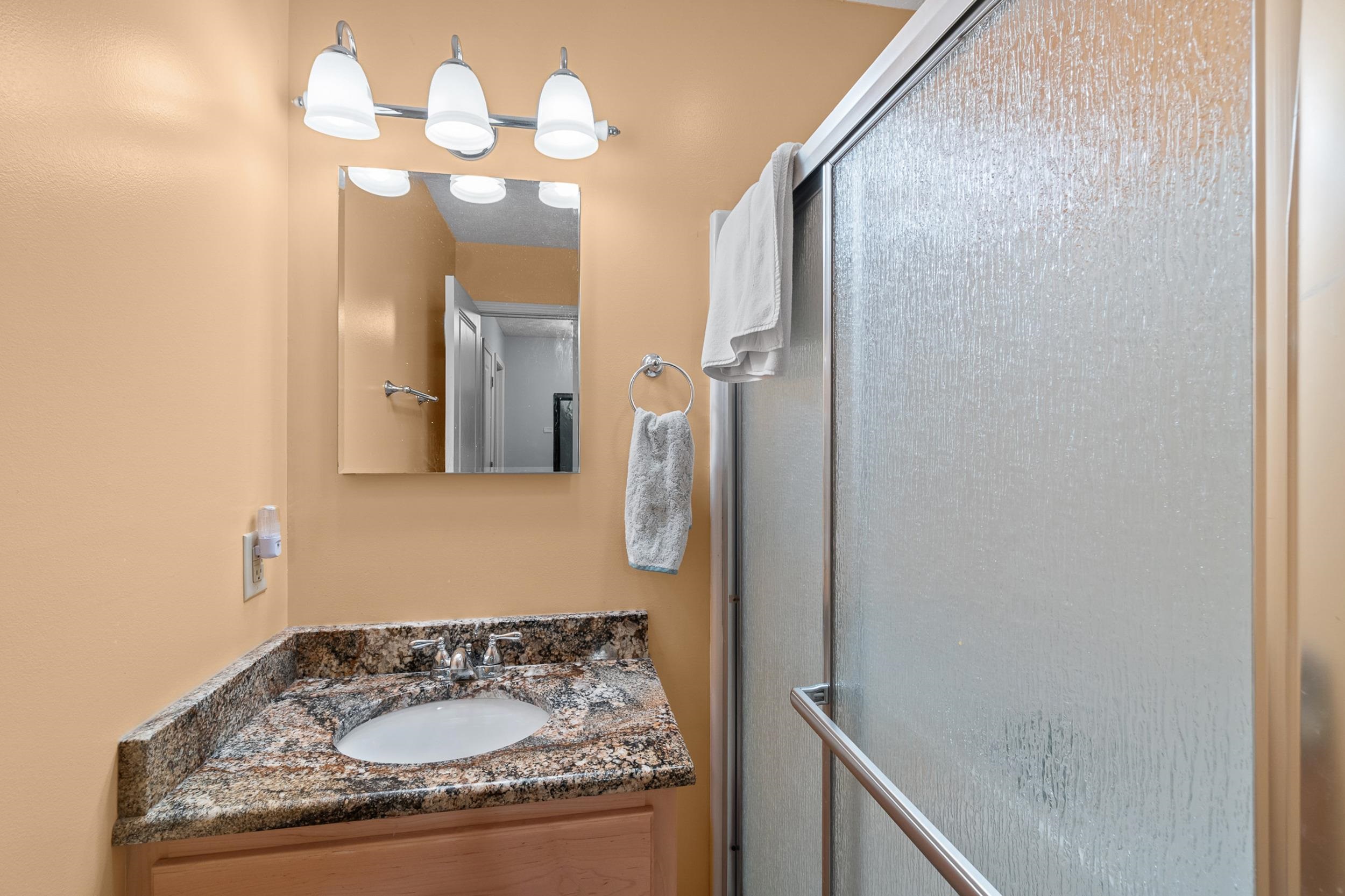 15 Marina Point Circle Iuka, MS 38852 - Photo 19 of 24 a bathroom with a sink vanity and a mirror
