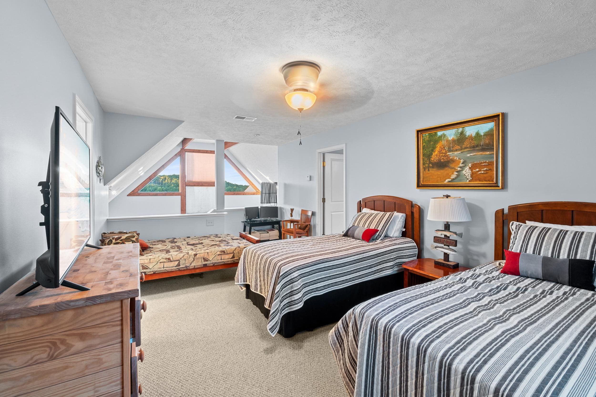 15 Marina Point Circle Iuka, MS 38852 - Photo 20 of 24 a bedroom with two beds and a window