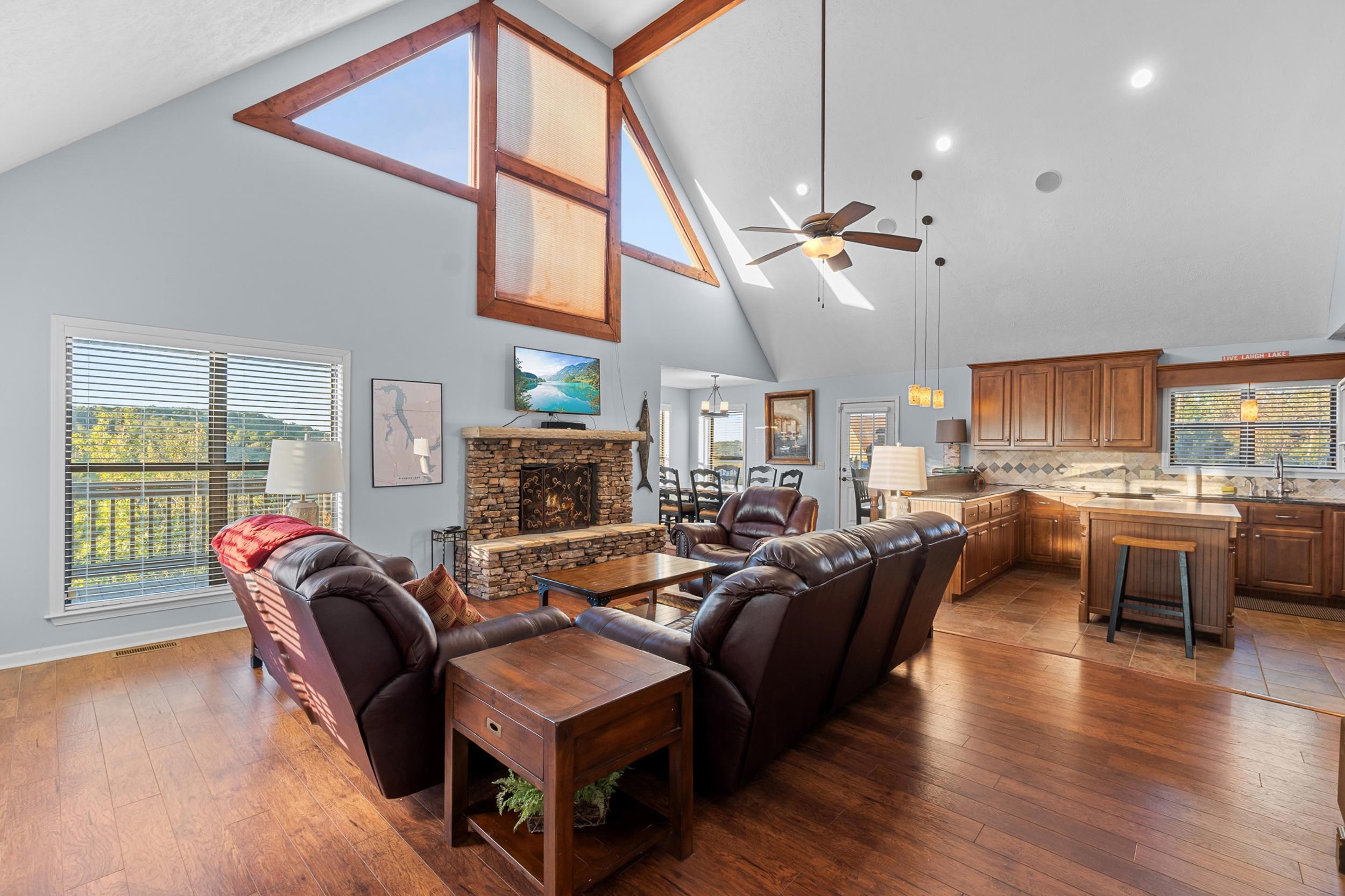 15 Marina Point Circle Iuka, MS 38852 - Photo 4 of 24 a living room with fireplace furniture and a large window
