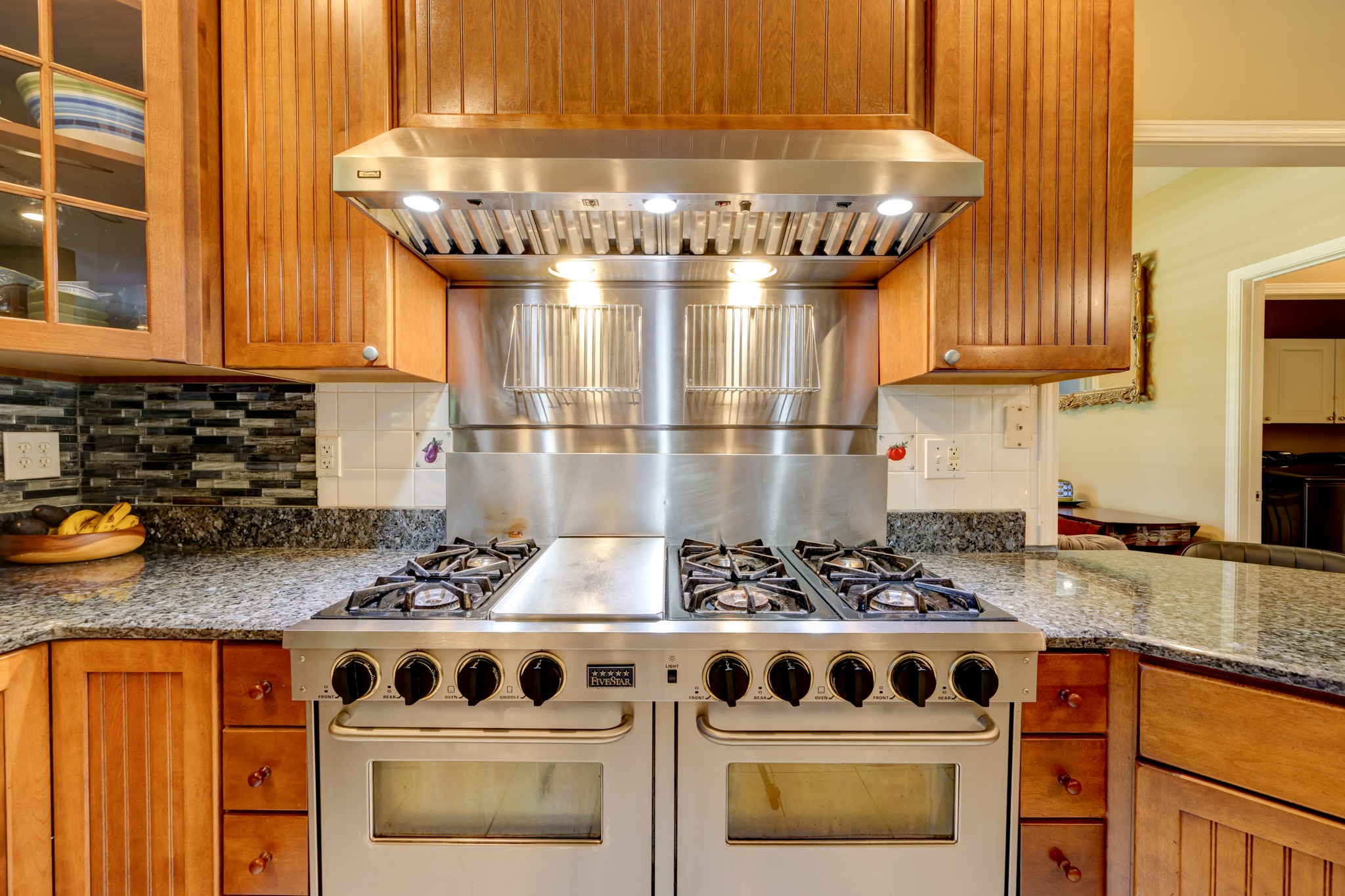 2251 Davidson Graveyard Road Clarksville, TN 37043 - Photo 37 of 78 a kitchen with a stove and a refrigerator