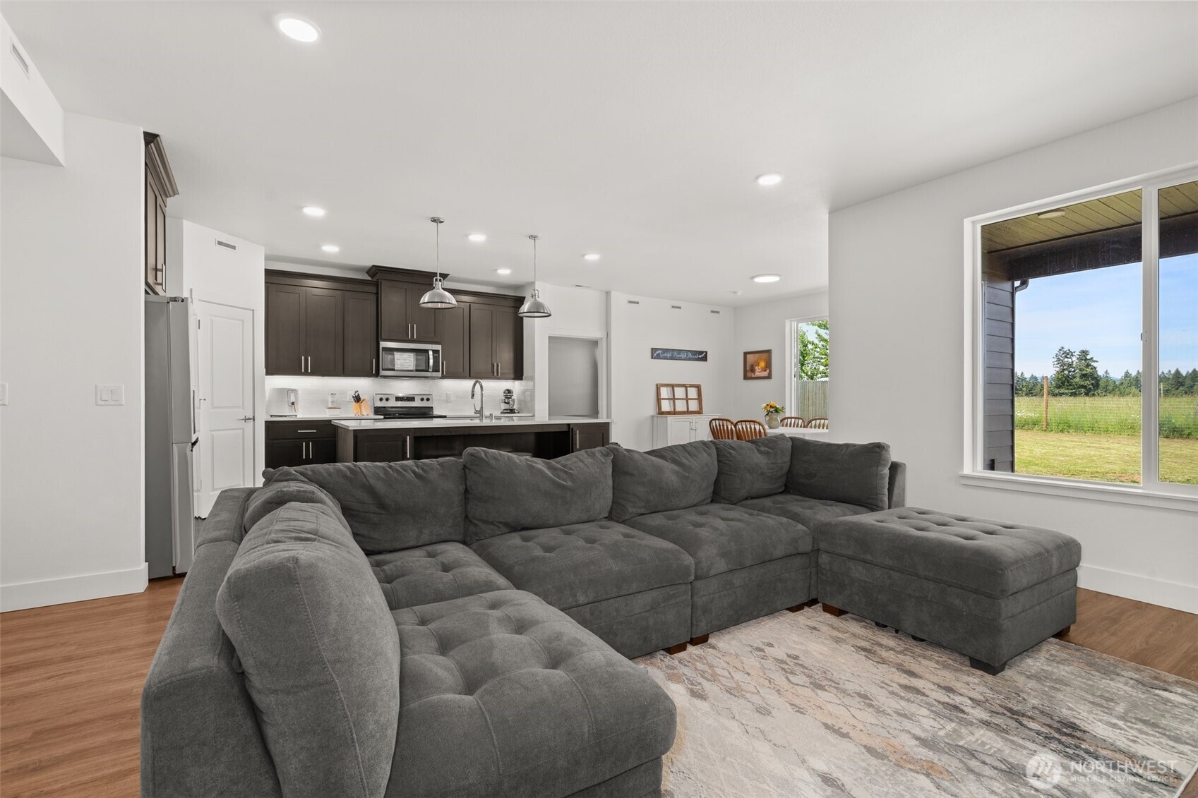 501 Pagget Avenue Winlock, WA 98596 - Photo 8 of 30 a living room with furniture and a large window