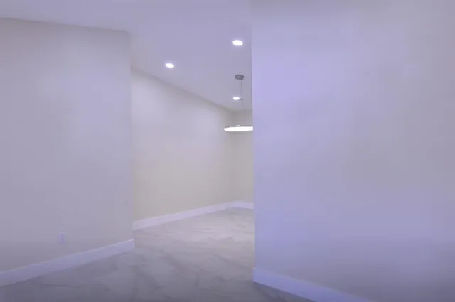 a view of a room with racks on the wall