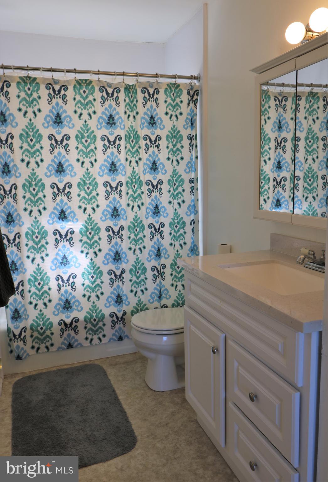 2312 Smoky Road Huntingtown, MD 20639 - Photo 16 of 55 Main level updated bathroom!