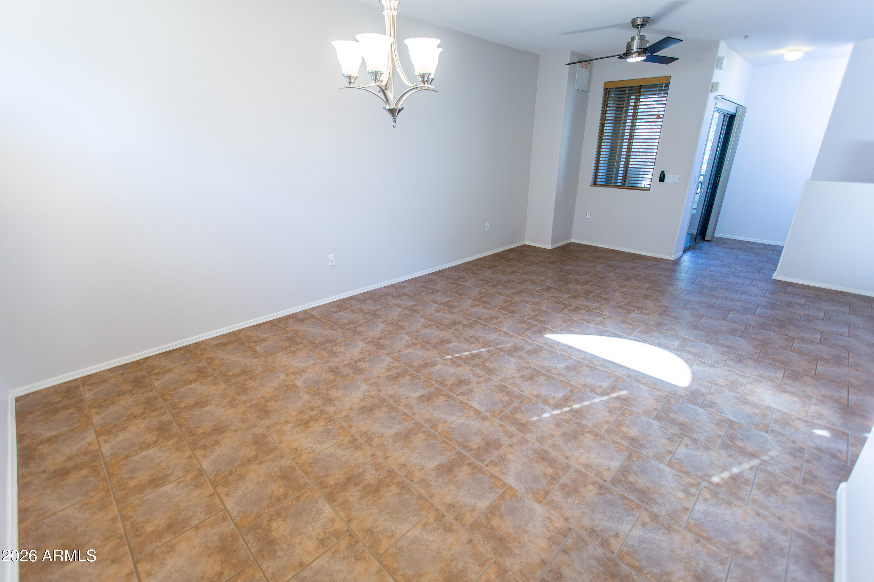 280 South Evergreen Road, Unit 1317 Tempe, AZ 85288 - Photo 33 of 33 wooden floor in an empty room with a window
