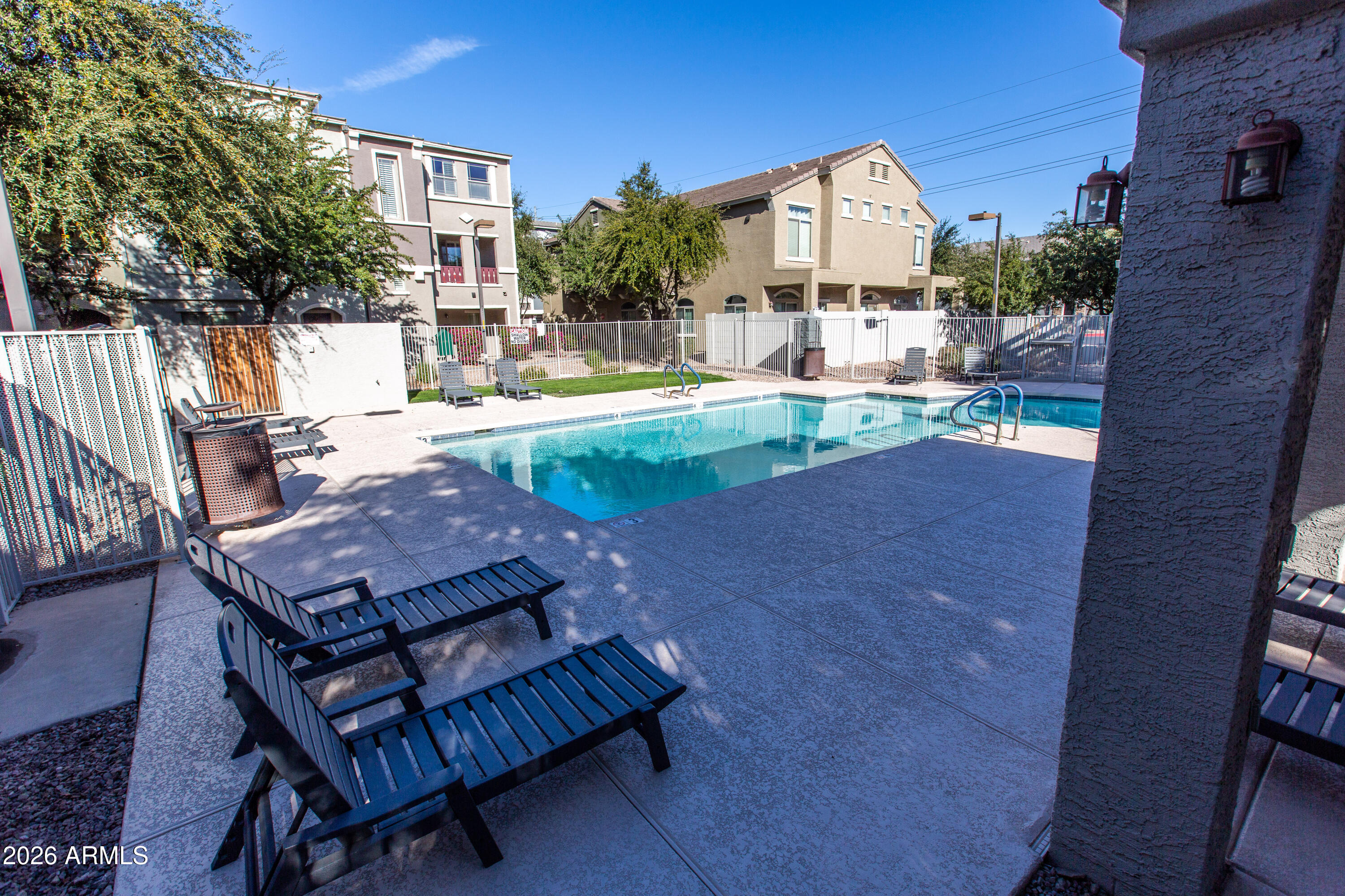 280 South Evergreen Road, Unit 1317 Tempe, AZ 85288 - Photo 5 of 33 a view of a backyard with sitting area