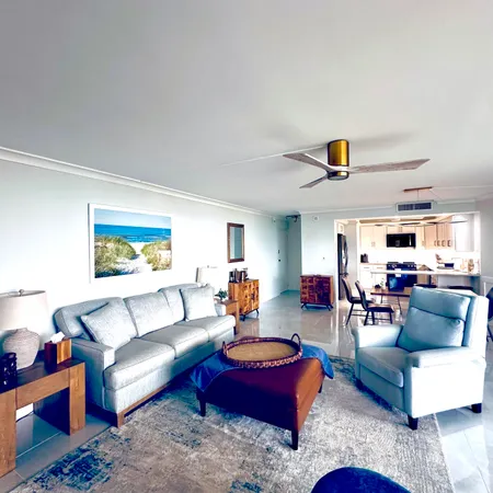 a living room with furniture and a couch