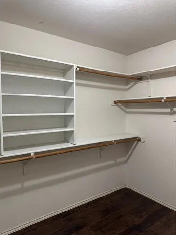 a view of small space with racks on the wall