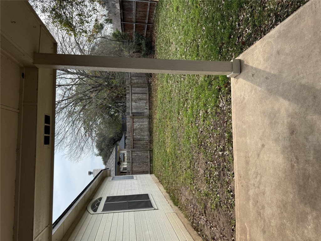 8724 Barrow Glen Loop Austin, TX 78749 - Photo 18 of 19 a backyard of a house with lots of green space