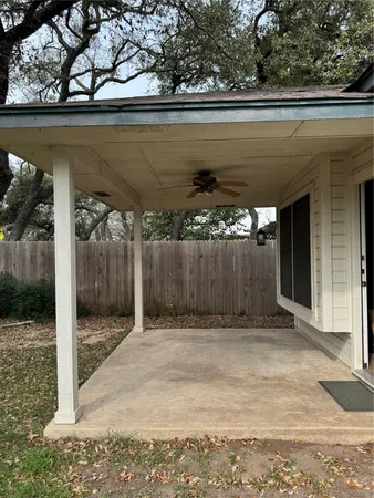 a view of backyard with green space