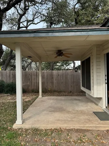 a view of backyard with green space