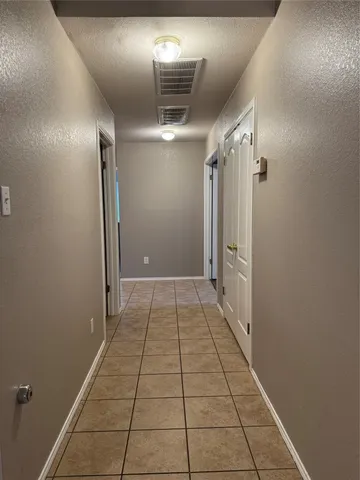 a view of hallway with stairs