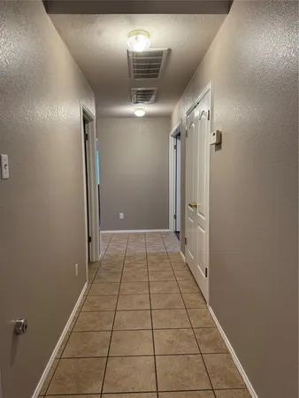 a view of hallway with stairs