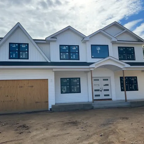 a front view of a house with windows