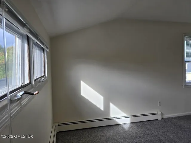 a view of a closet with windows