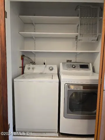 a utility room with dryer and washer