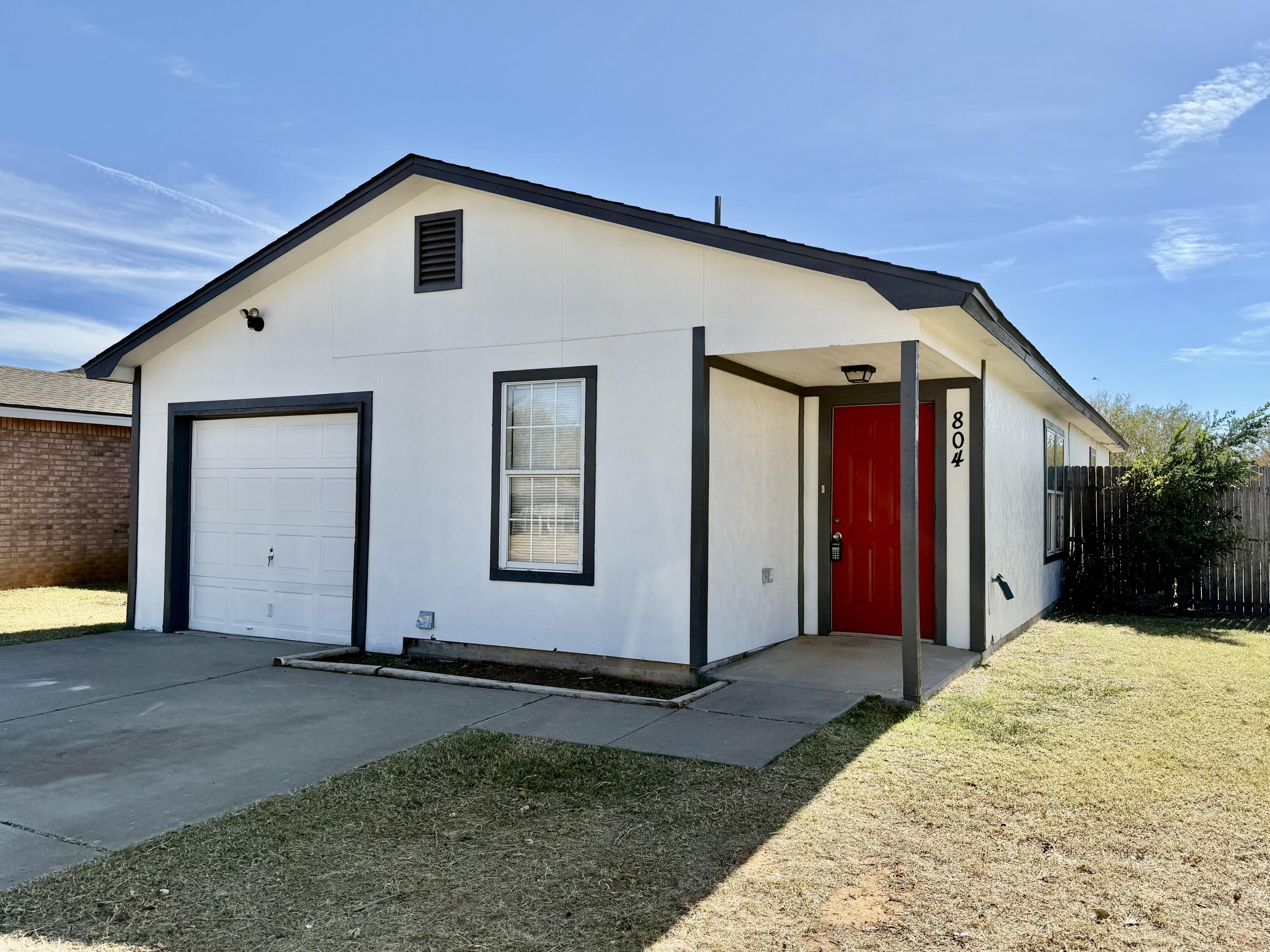 a front view of house with yard