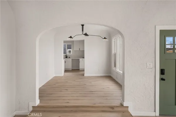 a view of an empty room and window