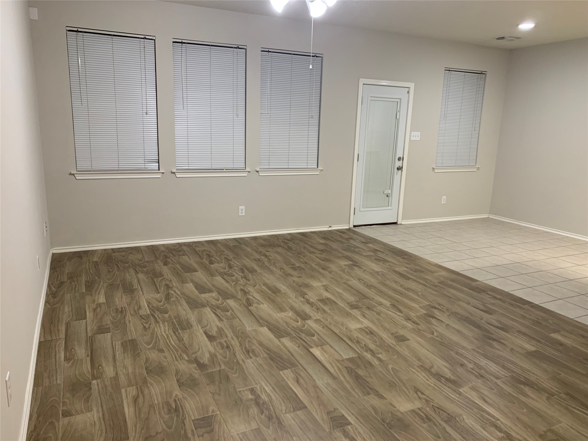 8904 Elm Drake Lane Humble, TX 77338 - Photo 6 of 22 Wood Tile flooring in Living Rm