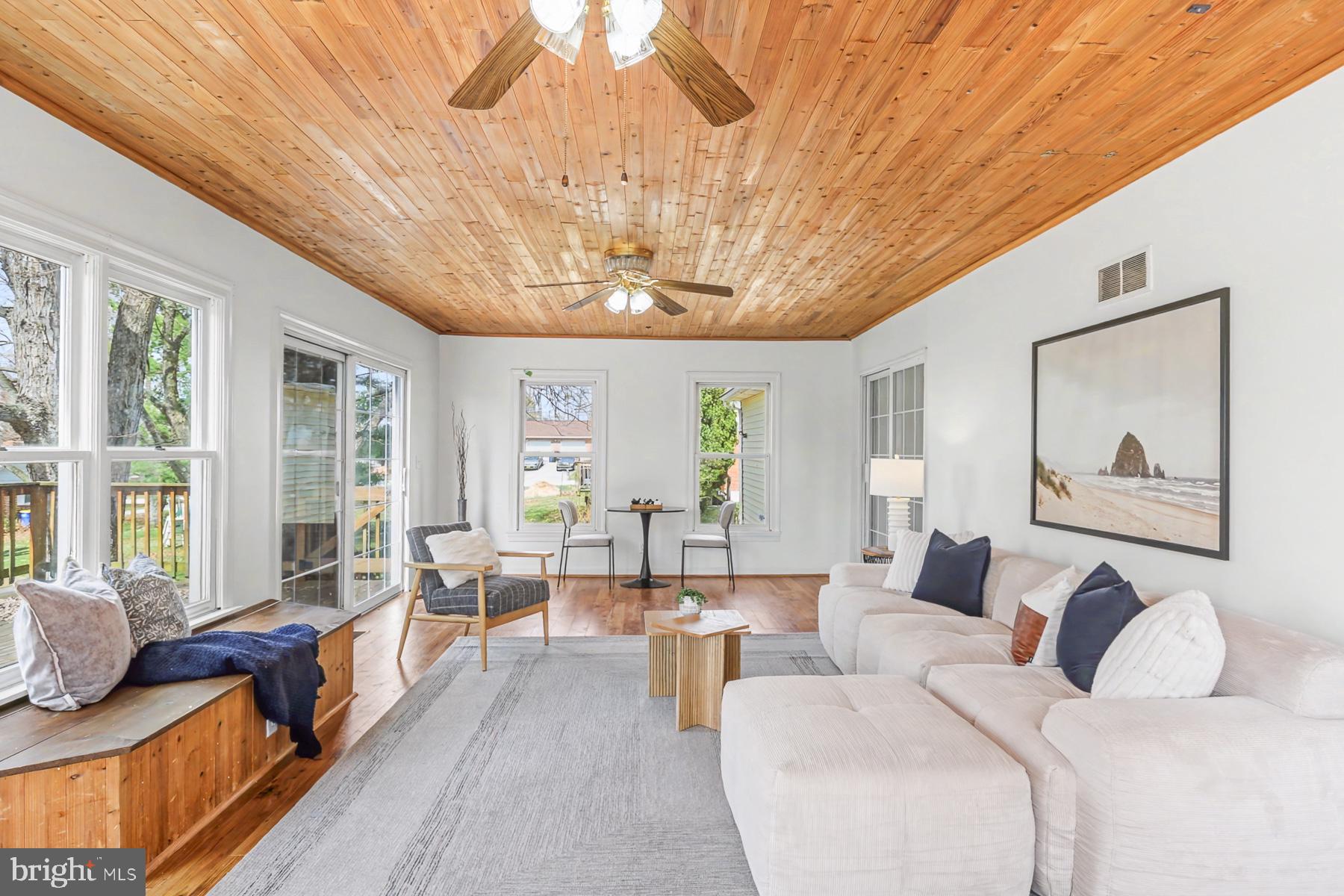12 Locust Street Stewartstown, PA 17363 - Photo 11 of 23 a living room with furniture and a large window