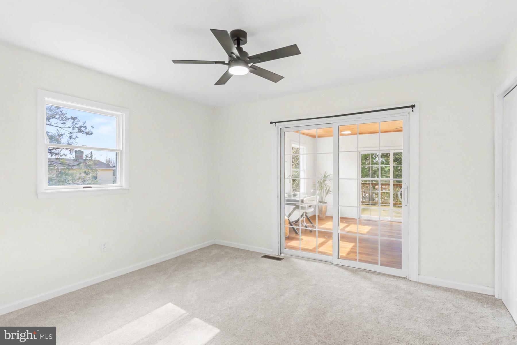 12 Locust Street Stewartstown, PA 17363 - Photo 15 of 23 a view of a livingroom with a ceiling fan and window