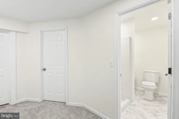 a bathroom with a toilet