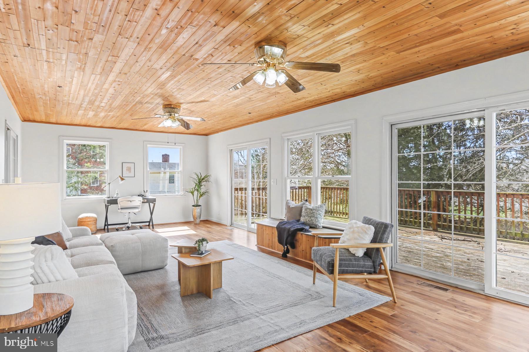 12 Locust Street Stewartstown, PA 17363 - Photo 10 of 23 a living room with furniture and a large window