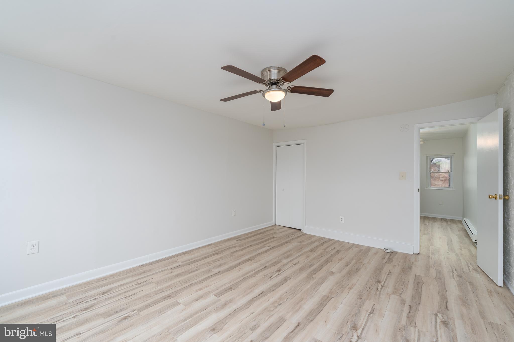 1722 Eastern Avenue, Unit 3 Baltimore, MD 21231 - Photo 12 of 13 a view of empty room with wooden floor