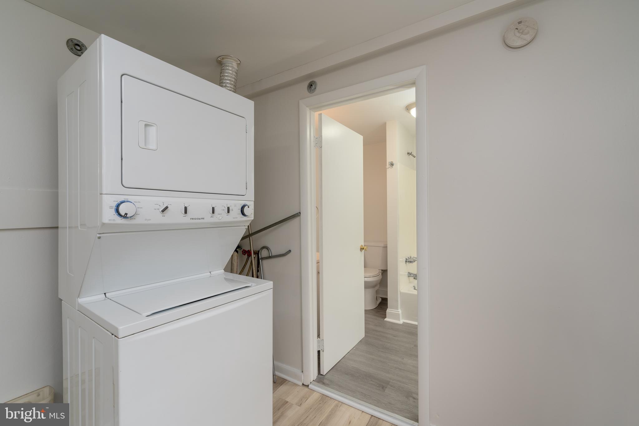 1722 Eastern Avenue, Unit 3 Baltimore, MD 21231 - Photo 13 of 13 a view of storage and utility room with washer and dryer