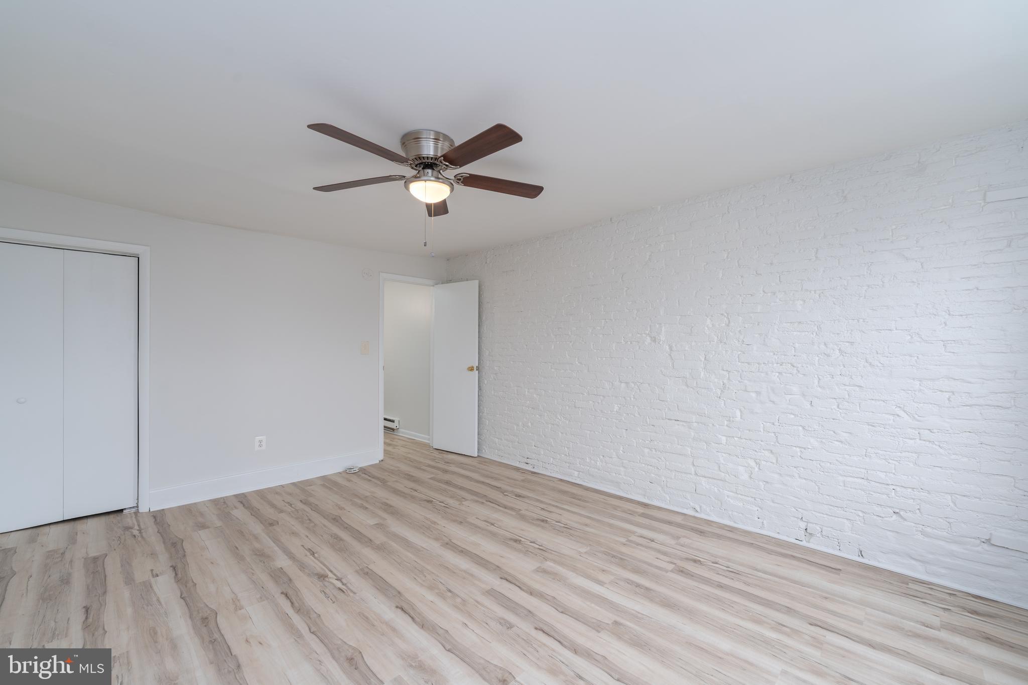 1722 Eastern Avenue, Unit 3 Baltimore, MD 21231 - Photo 7 of 13 a view of empty room with wooden floor