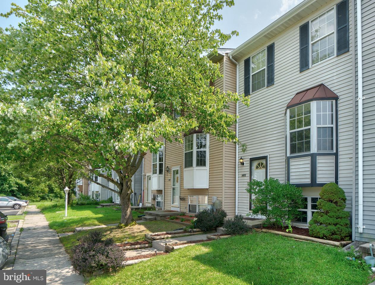 4083 Rustico Road Baltimore, MD 21220 - Photo 2 of 25 a view of a house with a yard and plants