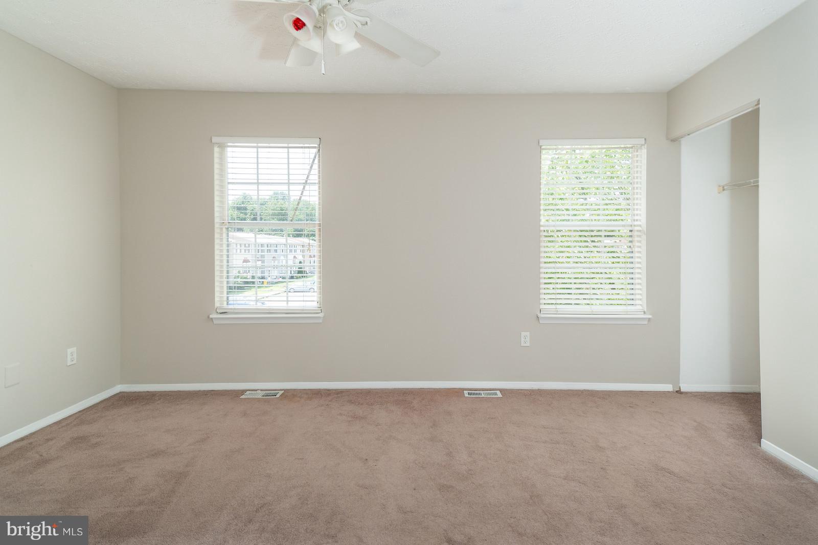 4083 Rustico Road Baltimore, MD 21220 - Photo 13 of 25 an empty room with windows