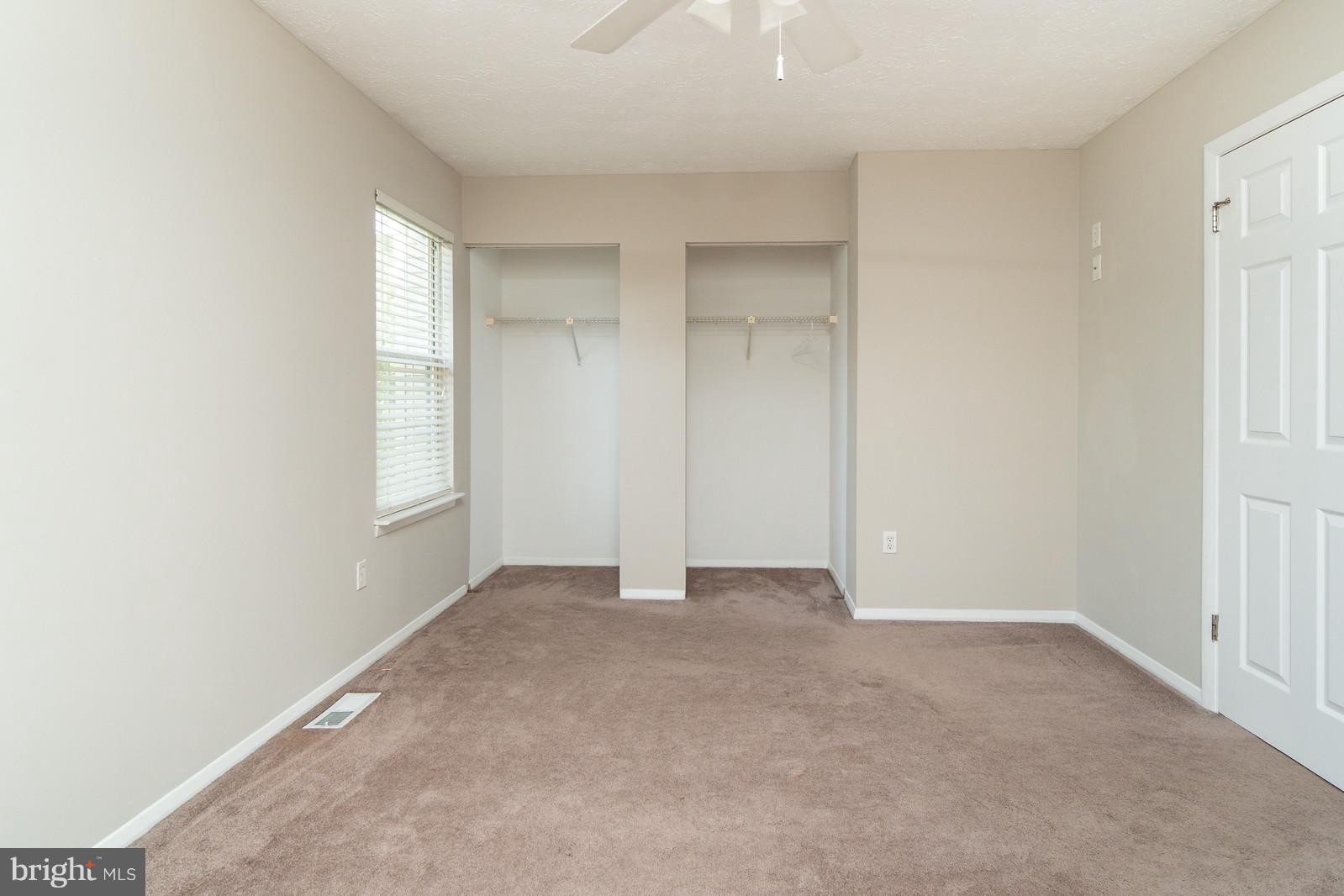 4083 Rustico Road Baltimore, MD 21220 - Photo 14 of 25 an empty room with windows
