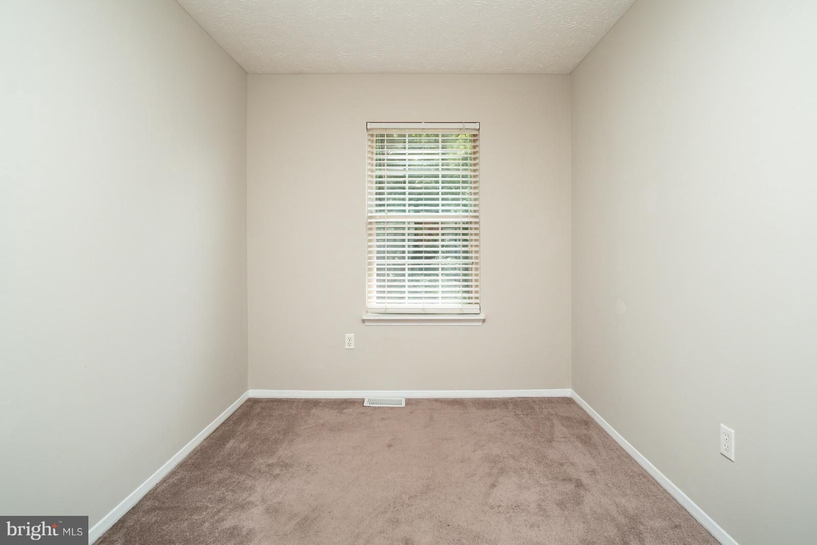 4083 Rustico Road Baltimore, MD 21220 - Photo 15 of 25 an empty room with a window