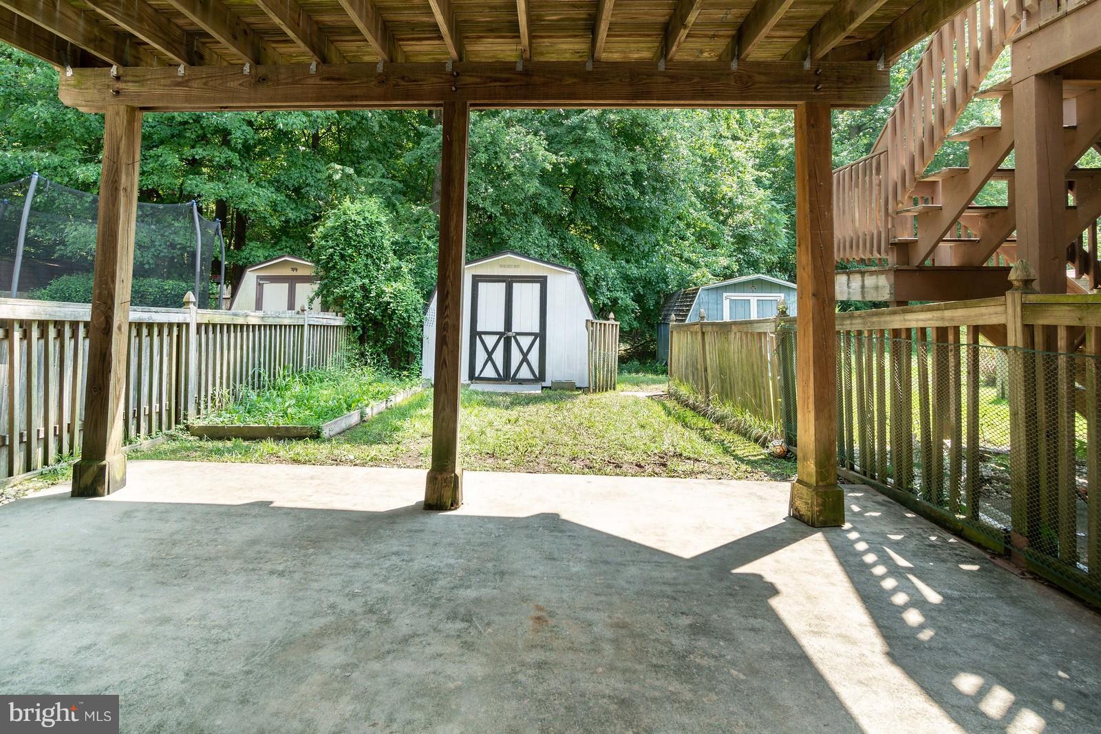 4083 Rustico Road Baltimore, MD 21220 - Photo 23 of 25 a view of a garden with a outdoor space