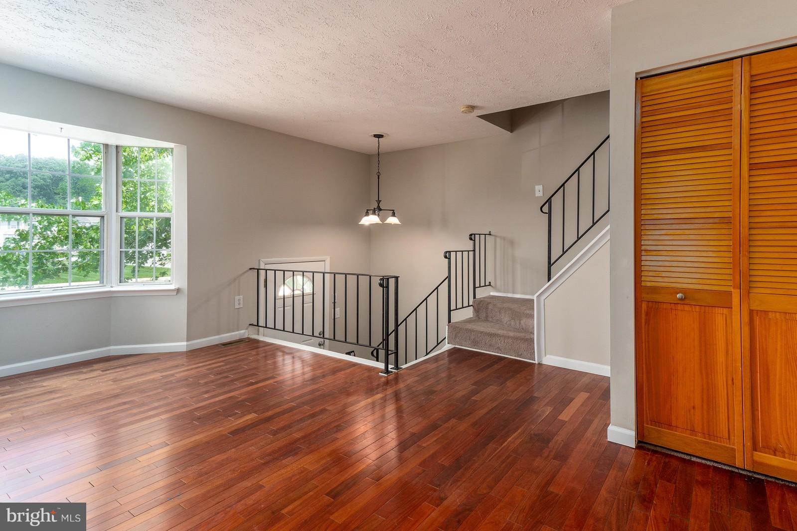 4083 Rustico Road Baltimore, MD 21220 - Photo 6 of 25 a view of an entryway with wooden floor