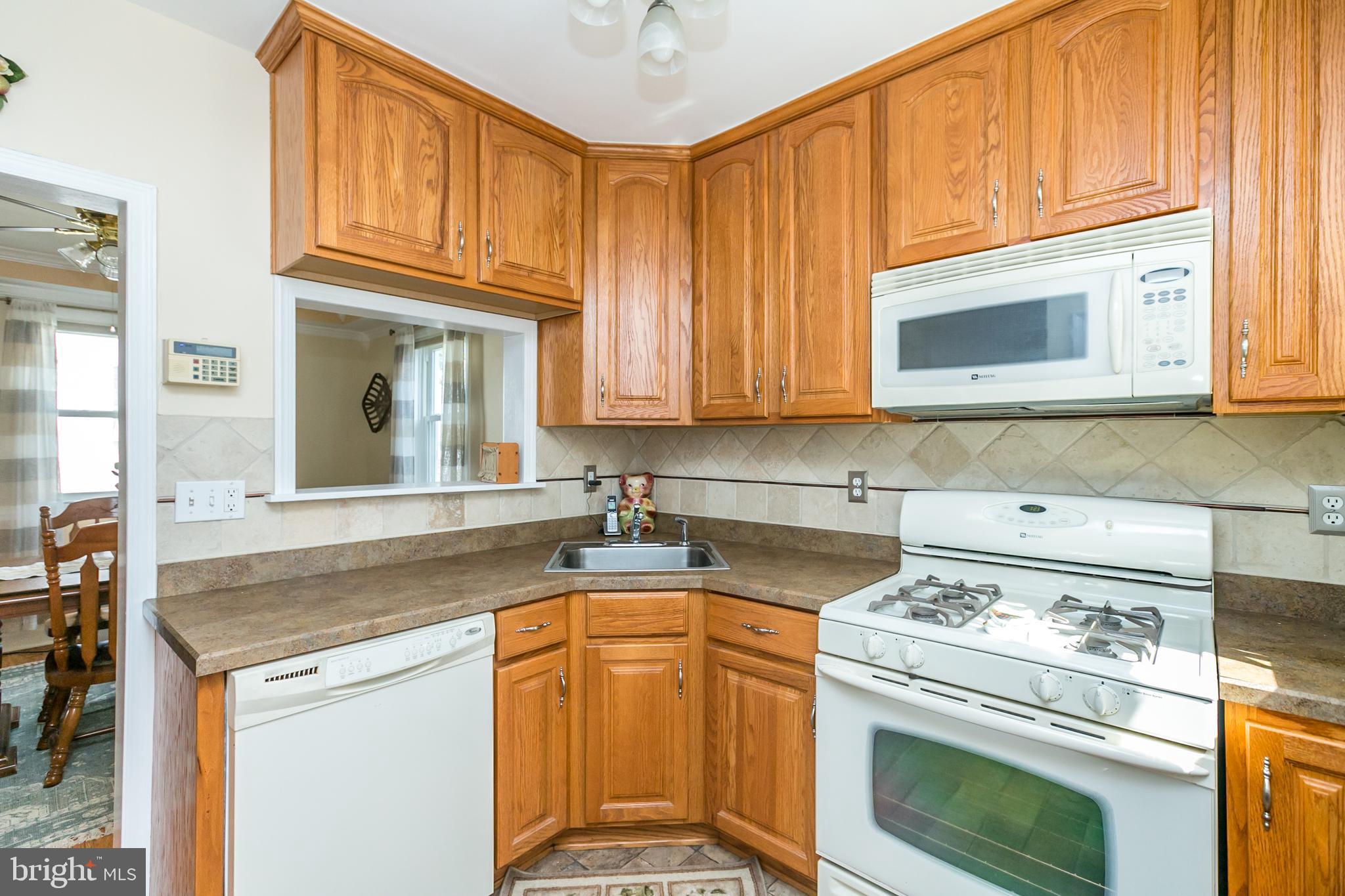 3003 Dunmurry Road Baltimore, MD 21222 - Photo 12 of 31 Open kitchen to the dining area