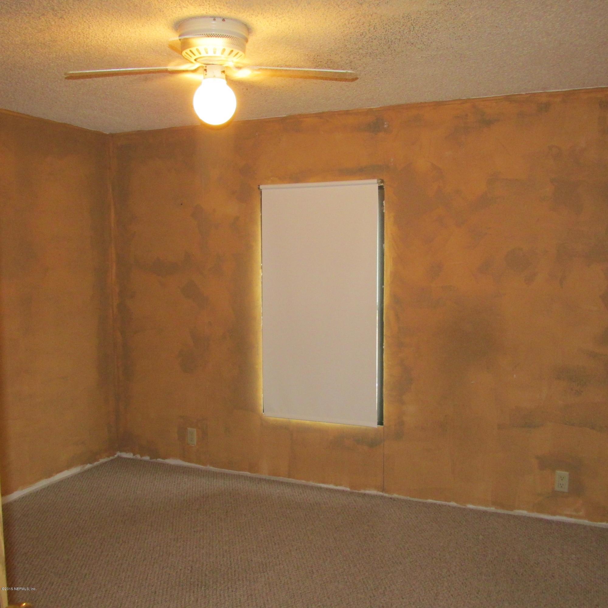 6841 Deer Springs Road Keystone Heights, FL 32656 - Photo 15 of 27 a view of small space with a door