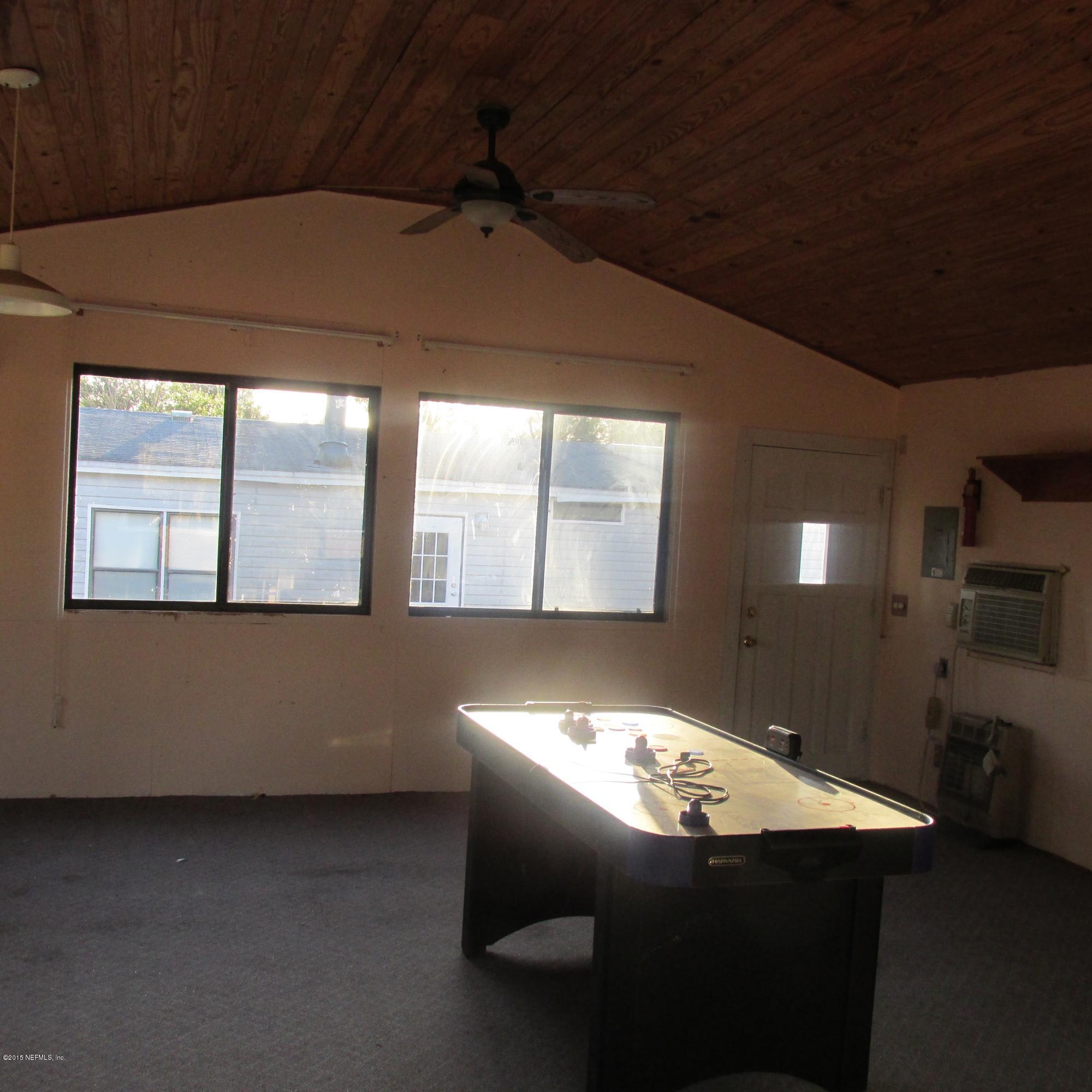 6841 Deer Springs Road Keystone Heights, FL 32656 - Photo 24 of 27 a view of an empty room with a window