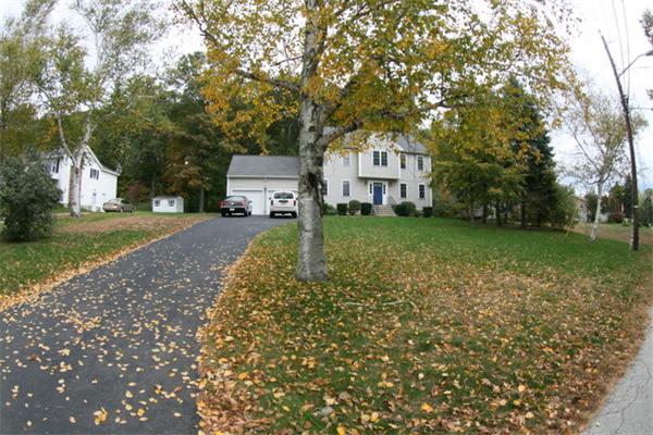 12 Hall Road Webster, MA 01570 - Photo 1 of 1 a house with trees in front of it