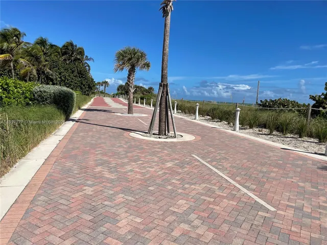 a view of a backyard of a house