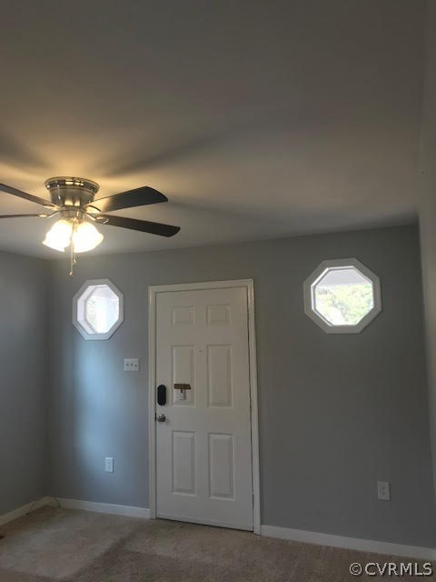7205 Drexelbrook Road Chesterfield, VA 23832 - Photo 2 of 8 a view of a chandelier fan and a wooden floor