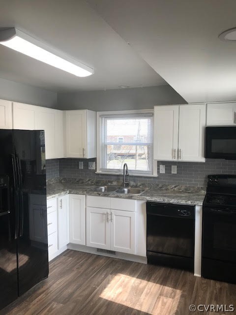 7205 Drexelbrook Road Chesterfield, VA 23832 - Photo 4 of 8 a kitchen with stainless steel appliances granite countertop a stove a sink and a refrigerator