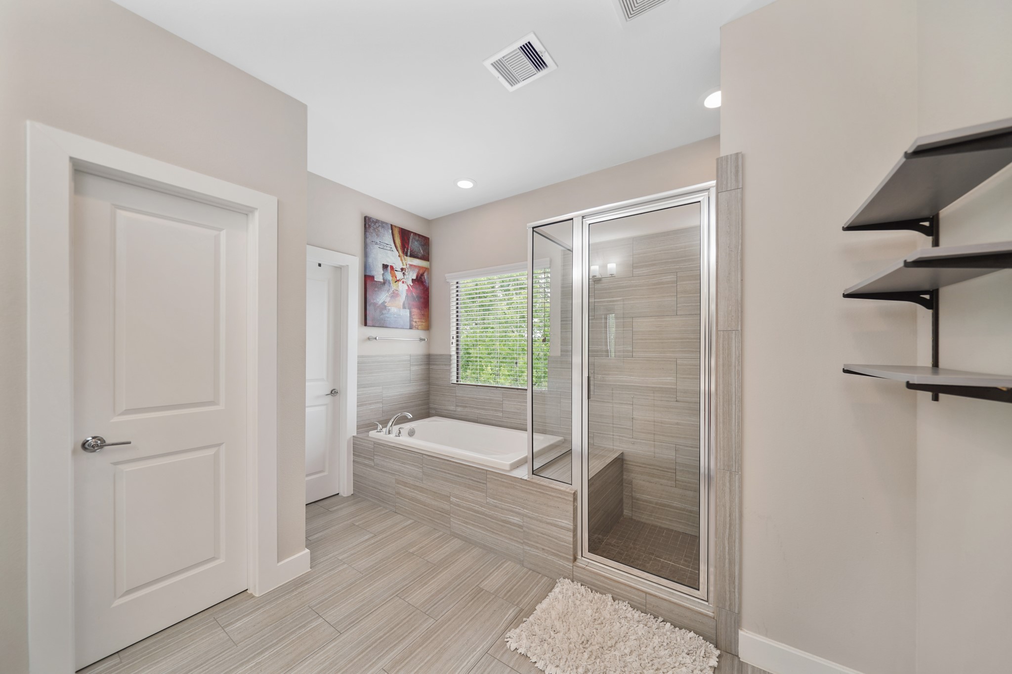 1824 Bonner Street Houston, TX 77007 - Photo 27 of 39 Additional features include a private water closet, a second walk-in wardrobe storage closet & tile flooring.